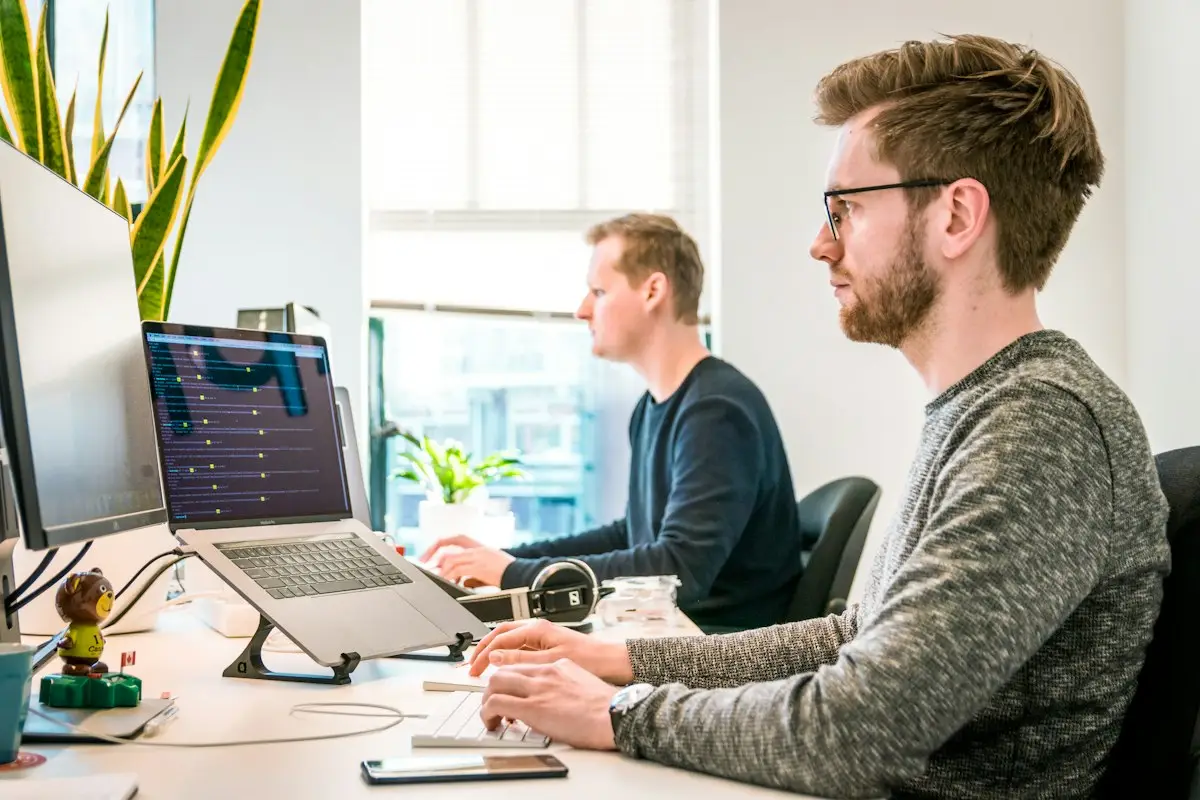 IT services company professionals collaborating on business technology solutions